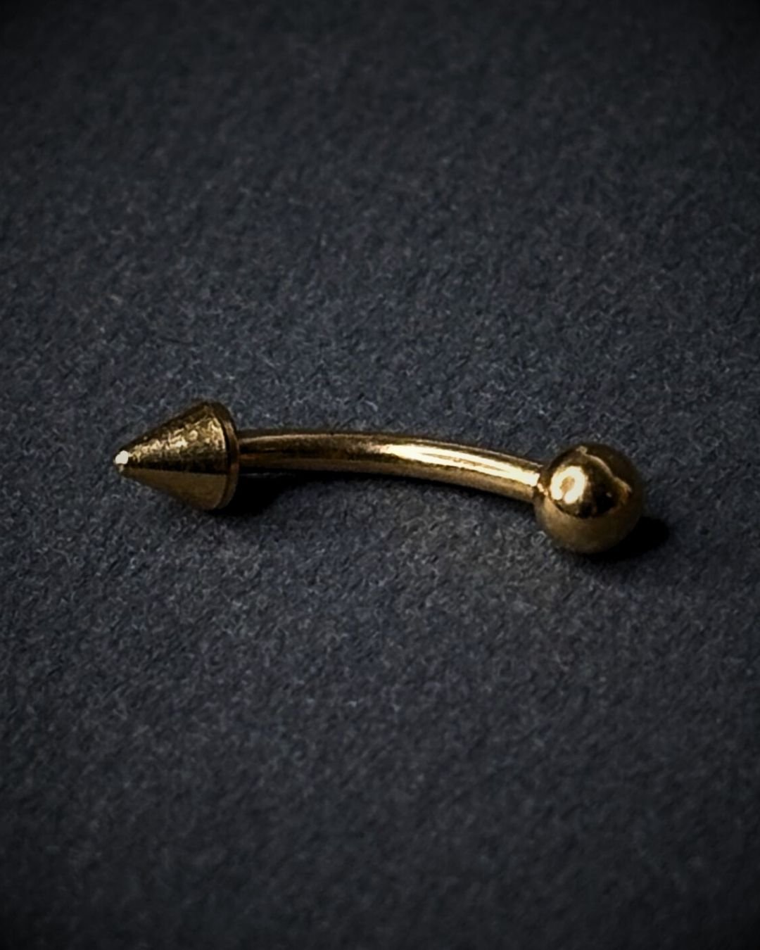 17 Curved Barbell with Ball and Spike - Image 1